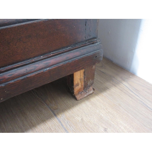 406 - A Georgian oak Mule Chest with two plank moulded lid above four panel front fitted two drawers and m... 