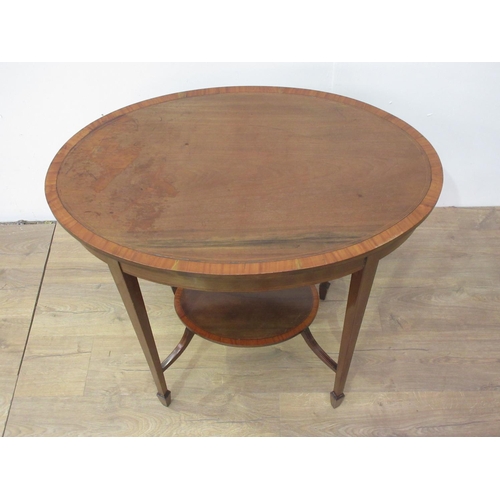 410 - An Edwardian mahogany and satinwood crossbanded oval Centre Table on square cut tapering supports 2f... 