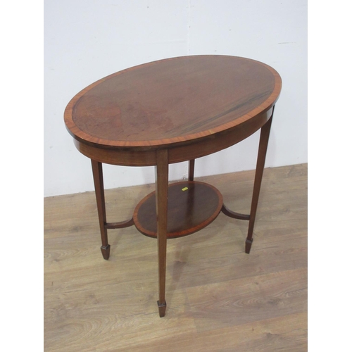 410 - An Edwardian mahogany and satinwood crossbanded oval Centre Table on square cut tapering supports 2f... 