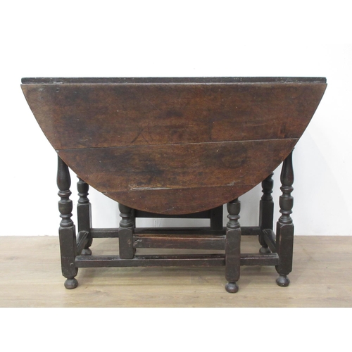 415 - A 17th Century oak Gateleg Table mounted upon turned supports 3ft 2in W x 2ft 5in H