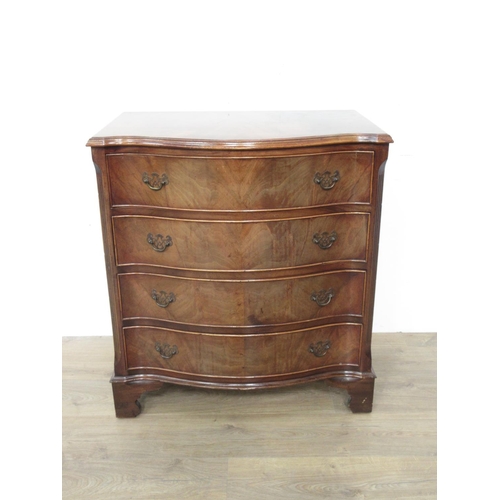 422 - A reproduction mahogany veneered serpentine Chest of four drawers mounted upon bracket feet 2ft 9in ... 