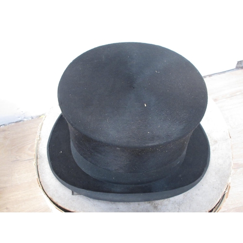 433 - A Scott & Co black silk Top Hat in leather box and a Christy's black Top Hat in card box