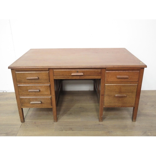 434 - A 20th Century oak Desk fitted six drawers 4ft 11in W x 2ft 6in H