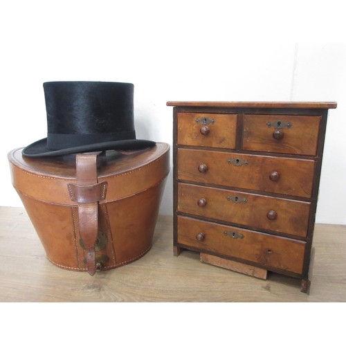 454 - A walnut apprentice piece Chest of drawers 1ft W and an Alfred Hall & Son black Top Hat in leather b... 