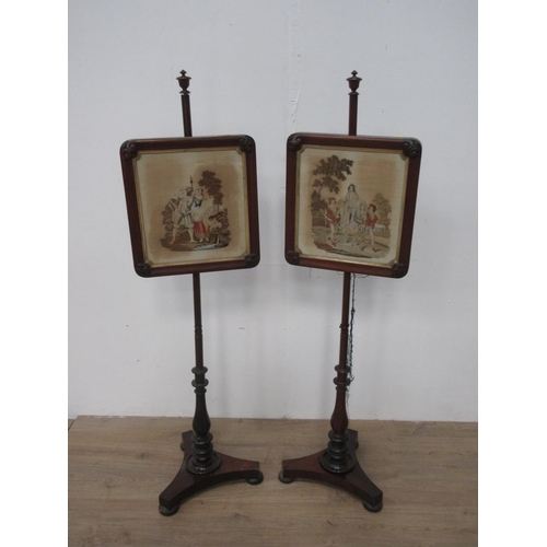 480 - A pair of Victorian rosewood framed Polescreens with needlework panels 4ft 8in H