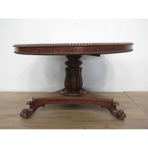 493 - A 19th century oak Breakfast Table mounted upon paw feet (one chewed) 3ft 10in D x 2ft 4in H