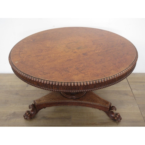 493 - A 19th century oak Breakfast Table mounted upon paw feet (one chewed) 3ft 10in D x 2ft 4in H