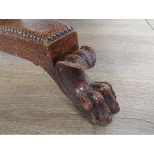 493 - A 19th century oak Breakfast Table mounted upon paw feet (one chewed) 3ft 10in D x 2ft 4in H