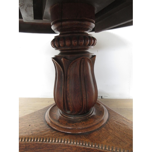 493 - A 19th century oak Breakfast Table mounted upon paw feet (one chewed) 3ft 10in D x 2ft 4in H