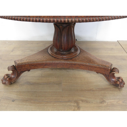 493 - A 19th century oak Breakfast Table mounted upon paw feet (one chewed) 3ft 10in D x 2ft 4in H