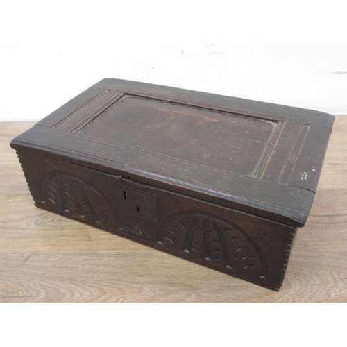 504A - An antique oak Bible Box with moulding to the front and carving to the front, 2ft W x 1ft 2 1/2in de... 