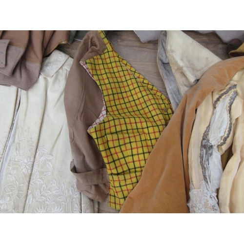 521 - A wicker Linen Basket containing a quantity of old costume including Waistcoats, Cape and Breeches