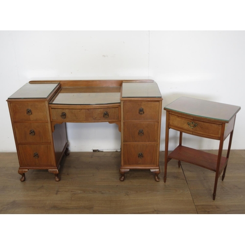 525 - A 20th Century walnut veneered Dressing Table fitted seven drawers 4ft W x 2ft 6in H and a Bedside T... 