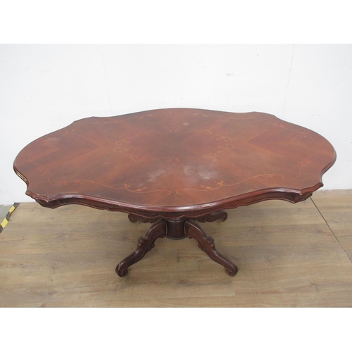 531 - A reproduction mahogany and marquetry veneered Loo Table with shaped top of four carved supports 5ft... 