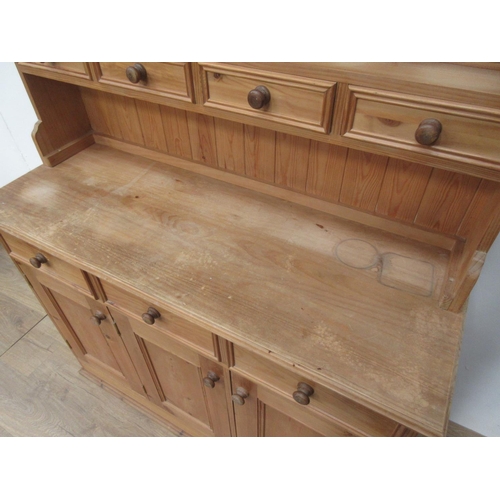 534 - A pine Kitchen Dresser and rack 6ft 2in H x 4ft W