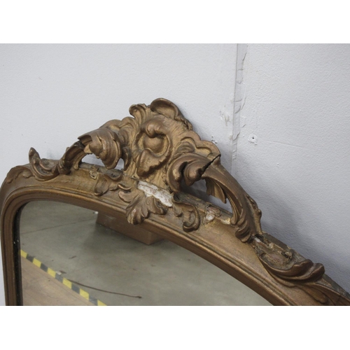 535 - An antique gilt framed Wall Mirror with scroll surmount A/F 4ft H x 1ft 10in W