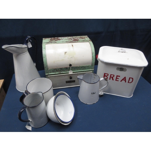 54 - A Bread and Cakes Bin, a Bread Bin, a large enamel Jug, another Jug, two enamel Bowls, etc.