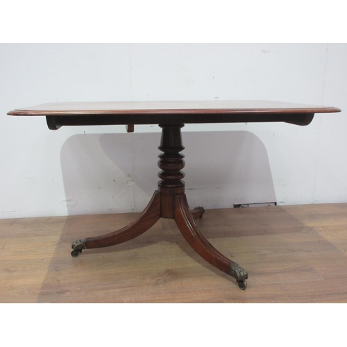 541 - A 19th Century mahogany Breakfast Table with moulded top mounted upon turned column and three legs w... 