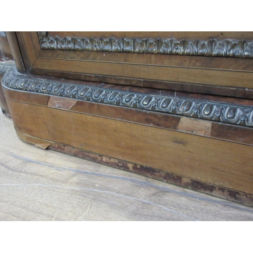 542 - A Victorian walnut veneered and inlaid Credenza with gilt metal mounts fitted pair of shaped glazed ... 