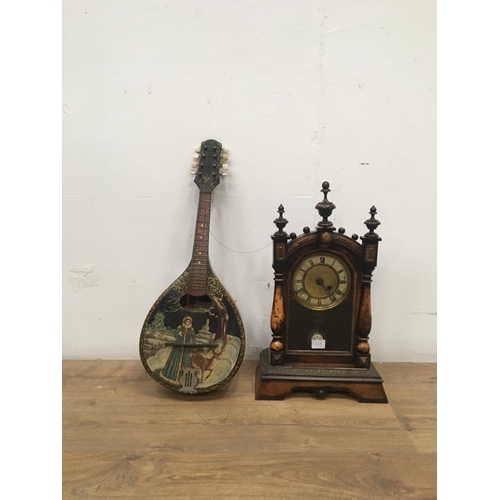 543B - A Continental Mantel Clock, 20in H and a Mandolin decorated Russian winter scene