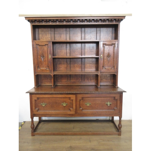 547 - A 20th Century oak Dresser and Rack fitted two drawers to base on turned supports united by surround... 