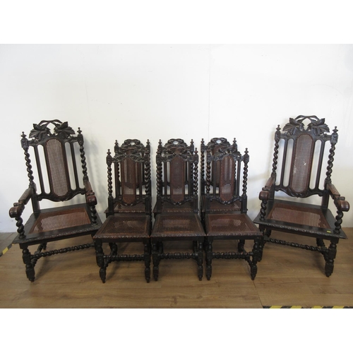 548 - A set of eight Victorian oak and cane Dining Chairs on barleytwist supports, viz; two carvers and si... 