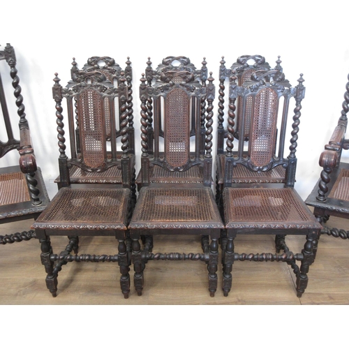 548 - A set of eight Victorian oak and cane Dining Chairs on barleytwist supports, viz; two carvers and si... 