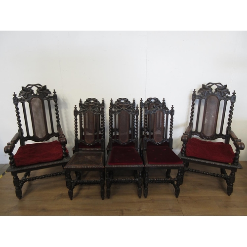 548 - A set of eight Victorian oak and cane Dining Chairs on barleytwist supports, viz; two carvers and si... 