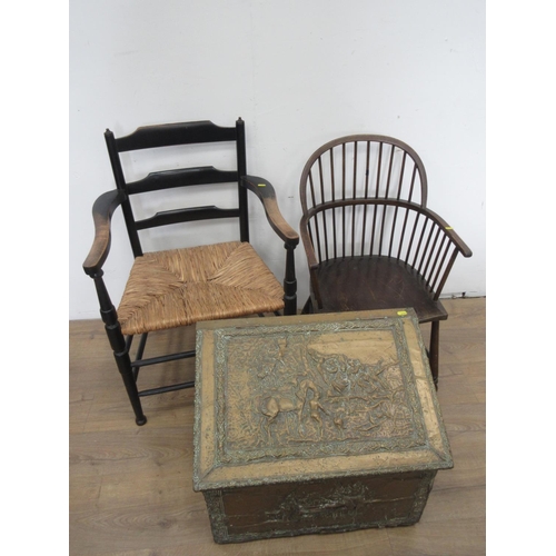 549A - An ash stick back Elbow Chair, an ebonised rush seated Chair and an embossed brass covered Coal Box