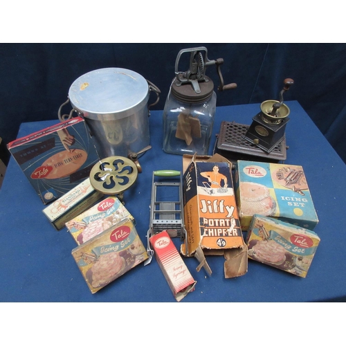 55 - A quantity of kitchen items including a glass Butter Churn, a Coffee Mill, brass Trivet, Potato Chip... 