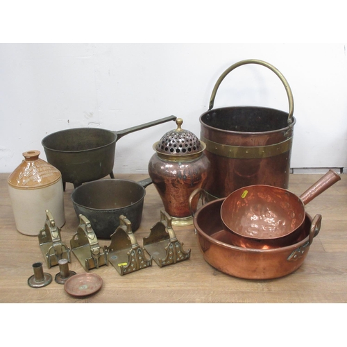 551A - An antique brass Coal Bin, two brass Pots, a brass Pan, Stirrups, etc