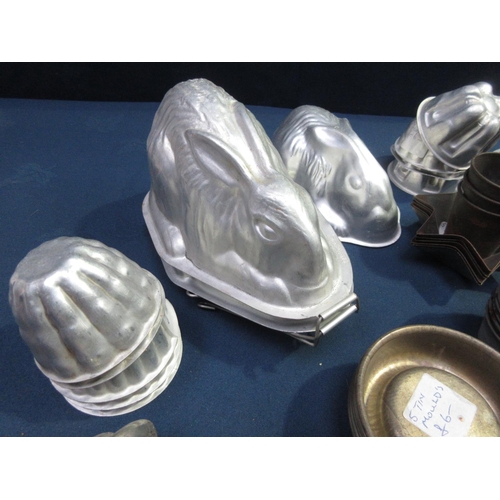 57 - A large quantity of small Jelly Moulds and Cake Tins/Cases