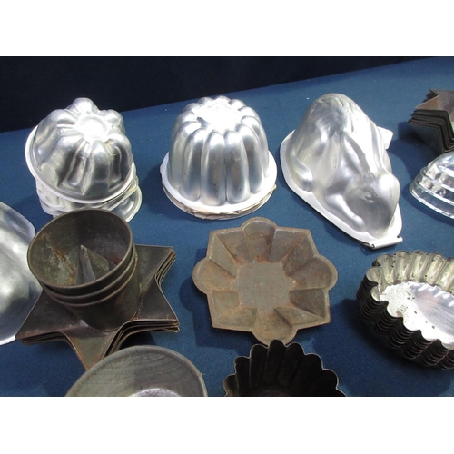 57 - A large quantity of small Jelly Moulds and Cake Tins/Cases