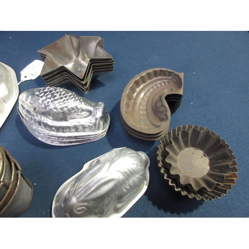 57 - A large quantity of small Jelly Moulds and Cake Tins/Cases