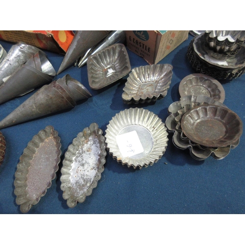 57 - A large quantity of small Jelly Moulds and Cake Tins/Cases