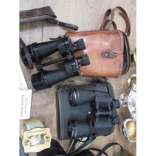 570 - Two pairs of Binoculars, two Spirit Flasks with Cups in cases, Jelly Mould, Shell Case, silver plate... 