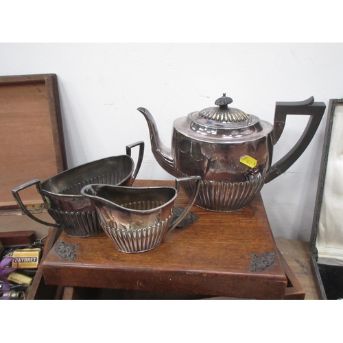 578 - A Box of Silver Plate and Cutlery including, a three piece Coffee Set, Spoons, Knifes, Brush Set, an... 