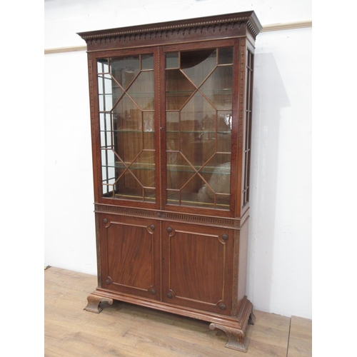 73 - A reproduction Georgian style mahogany and astragal glazed Bookcase, maker, Robson & son, Newcastle ... 