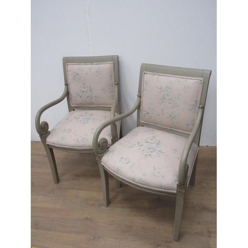 88 - A pair of green painted Regency style Elbow Chairs with scroll arms and off white rose decorated uph... 