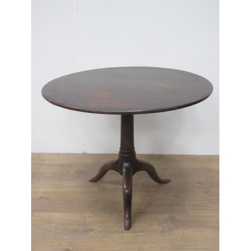 93 - An 18th Century mahogany Pillar Table with single piece top on turned column with damaged pad feet 2... 