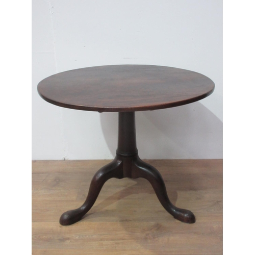 94 - A Georgian mahogany Pillar Table with single piece top mounted upon turned column and pad feet 2ft 8... 