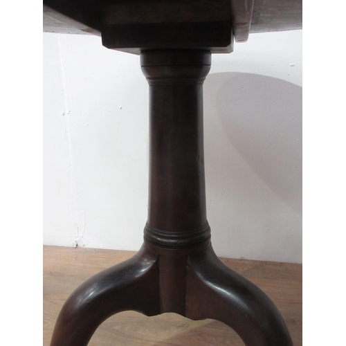 94 - A Georgian mahogany Pillar Table with single piece top mounted upon turned column and pad feet 2ft 8... 