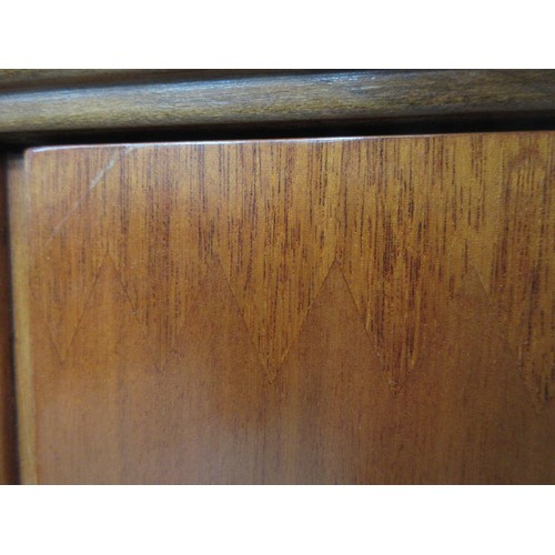 118 - A 1970's Danish style mahogany two door Cupboard fitted two brushing slides 4ft 3in H x 2ft 11in W