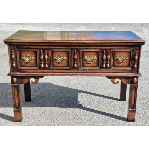 551 - A reproduction oak Dresser Base in the 17th Century style fitted two moulded drawers with brass hand... 