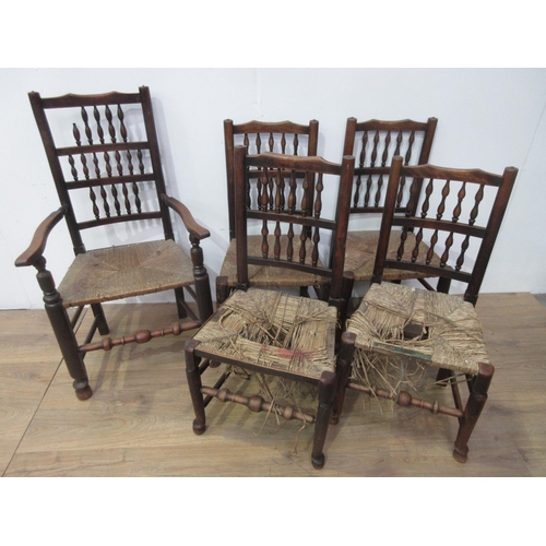 126 - A set of five antique spindle back Lancashire Chairs with rush seats, viz; one carver and four singl... 