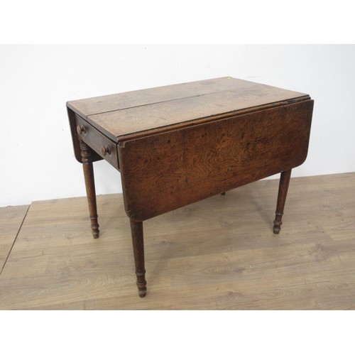 423 - A 19th Century oak Pembroke Table with drawer to each end mounted upon turned supports 2ft 11in W x ... 