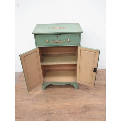 105 - A small painted Cupboard, fitted a drawer above a pair of cupboard doors and painted sprays of flowe... 