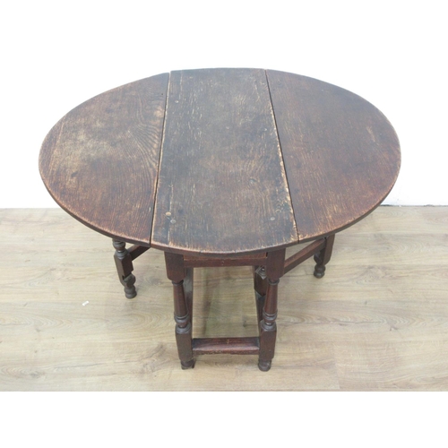 115 - A 17th Century oak Gateleg Table with oval top, fitted frieze drawer on turned supports, 3ft 3in