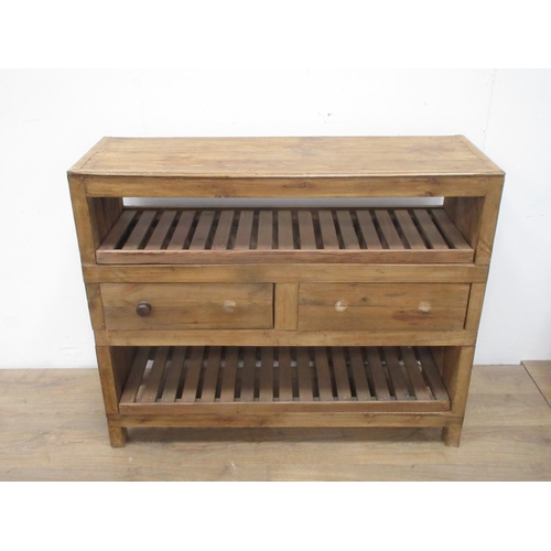 300 - A pine Kitchen Piece with racks and drawers, 4ft 1in W