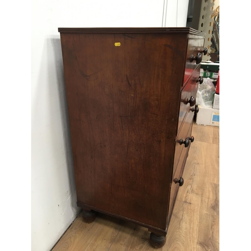 342A - A large 19th Century mahogany Chest of four long graduated drawers on turned supports, 3ft 9in W x 3... 